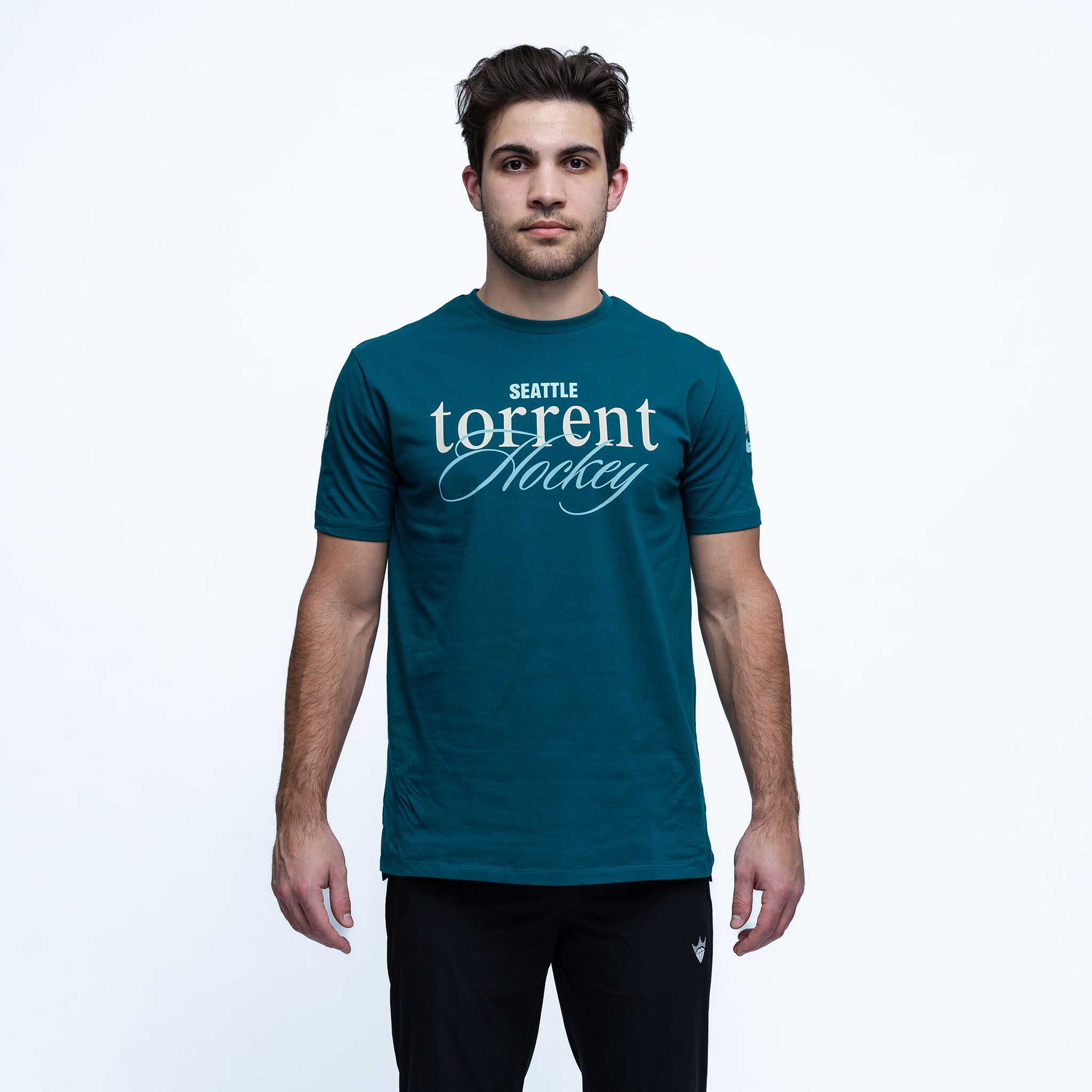 Man wearing a teal t-shirt with 'Seattle torrent Hockey' text on a white background