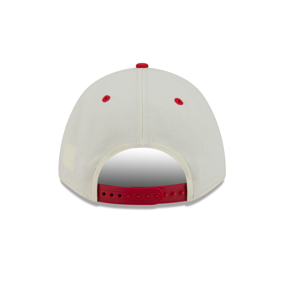 The back view of a baseball cap in off-white canvas with red accents on the button, eyelets, and adjustable strap.