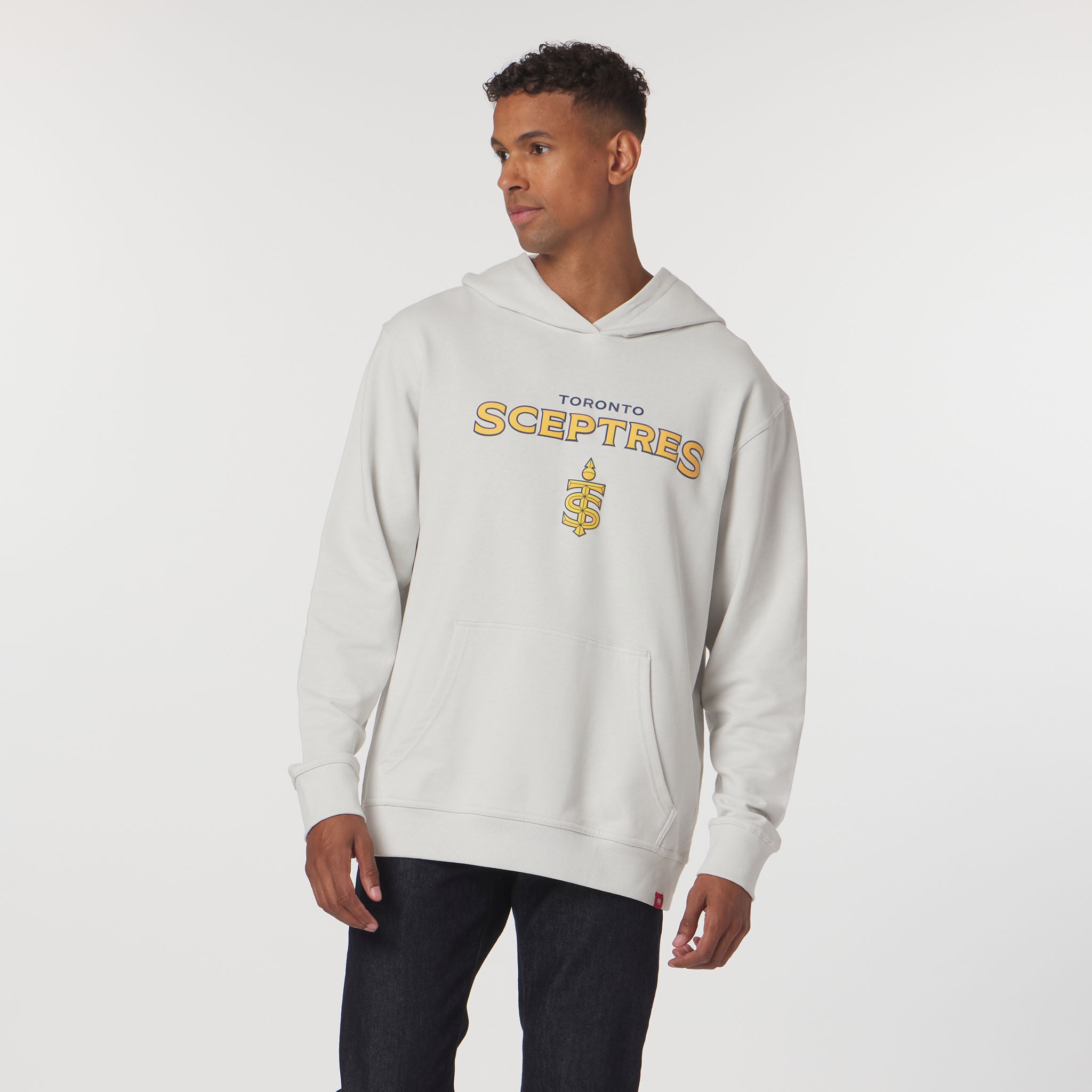 Man wearing a white hoodie with 'Toronto Sceptres' text and logo on a white background