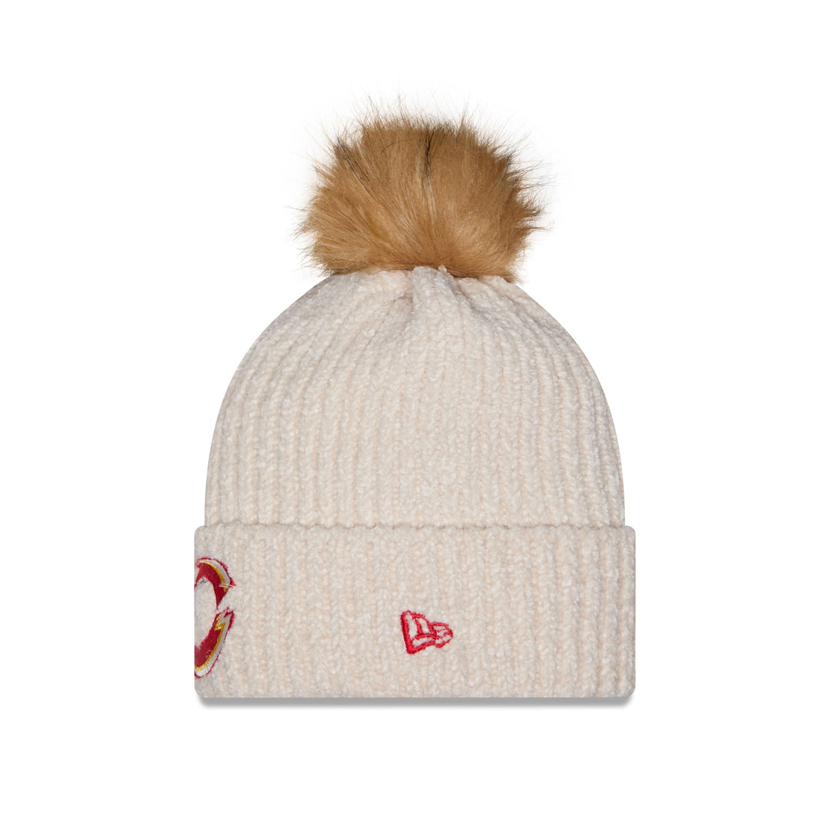 A cream-colored ribbed knit pom-pom beanie featuring a red embroidered New Era logo on the cuff and a red-and-gold circular graphic on the opposite side, topped with a fluffy tan pom-pom.