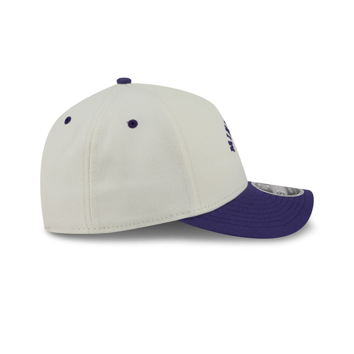 A structured baseball cap in off-white with a dark purple brim, matching purple eyelets, and a purple button on top. The off-white crown has a subtle purple embroidered logo on the side, and a silver New Era 9FIFTY sticker is visible on the edge of the purple brim.