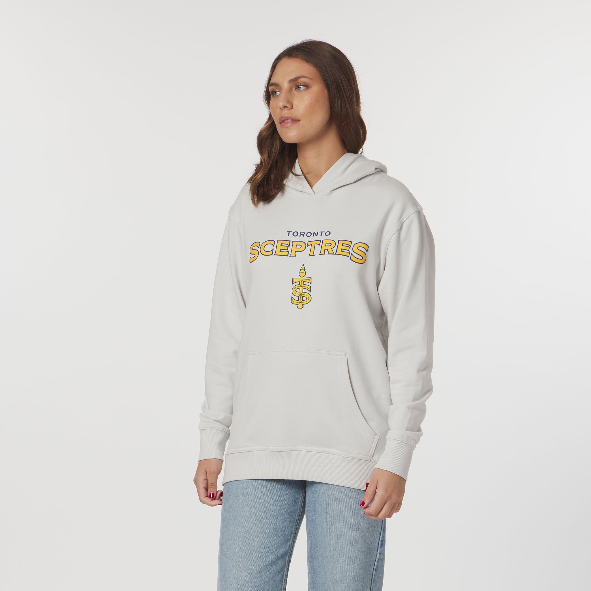 Woman wearing a light gray hoodie with 'Toronto Sceptres' text and logo on a white background