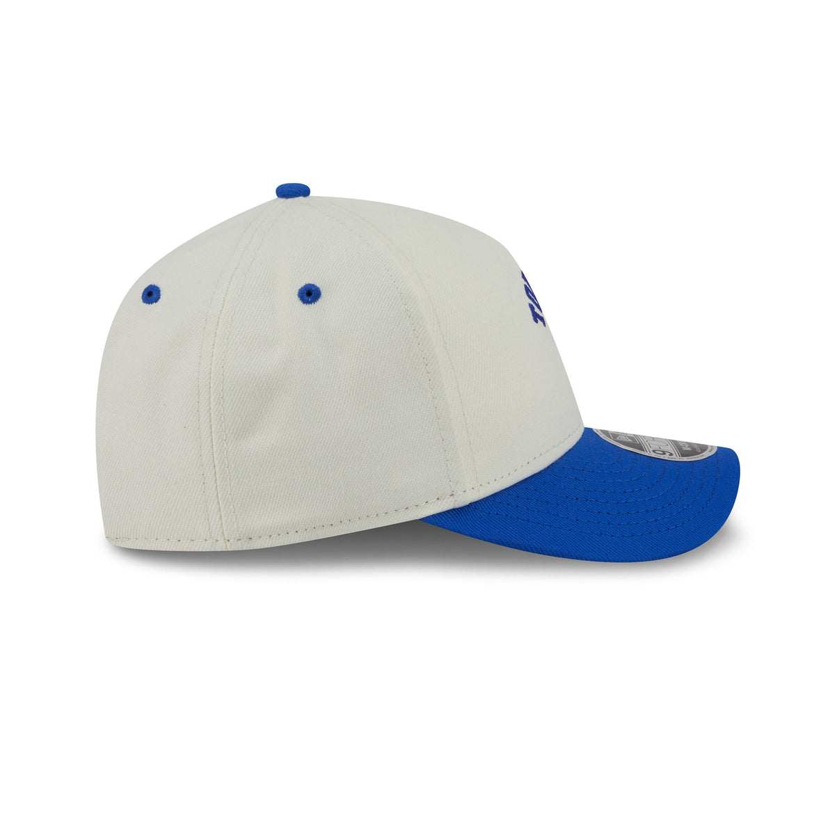 A structured baseball cap in off-white with a bright blue visor, blue eyelets, and a blue button on top, shown from a three-quarters angle on a white background.
