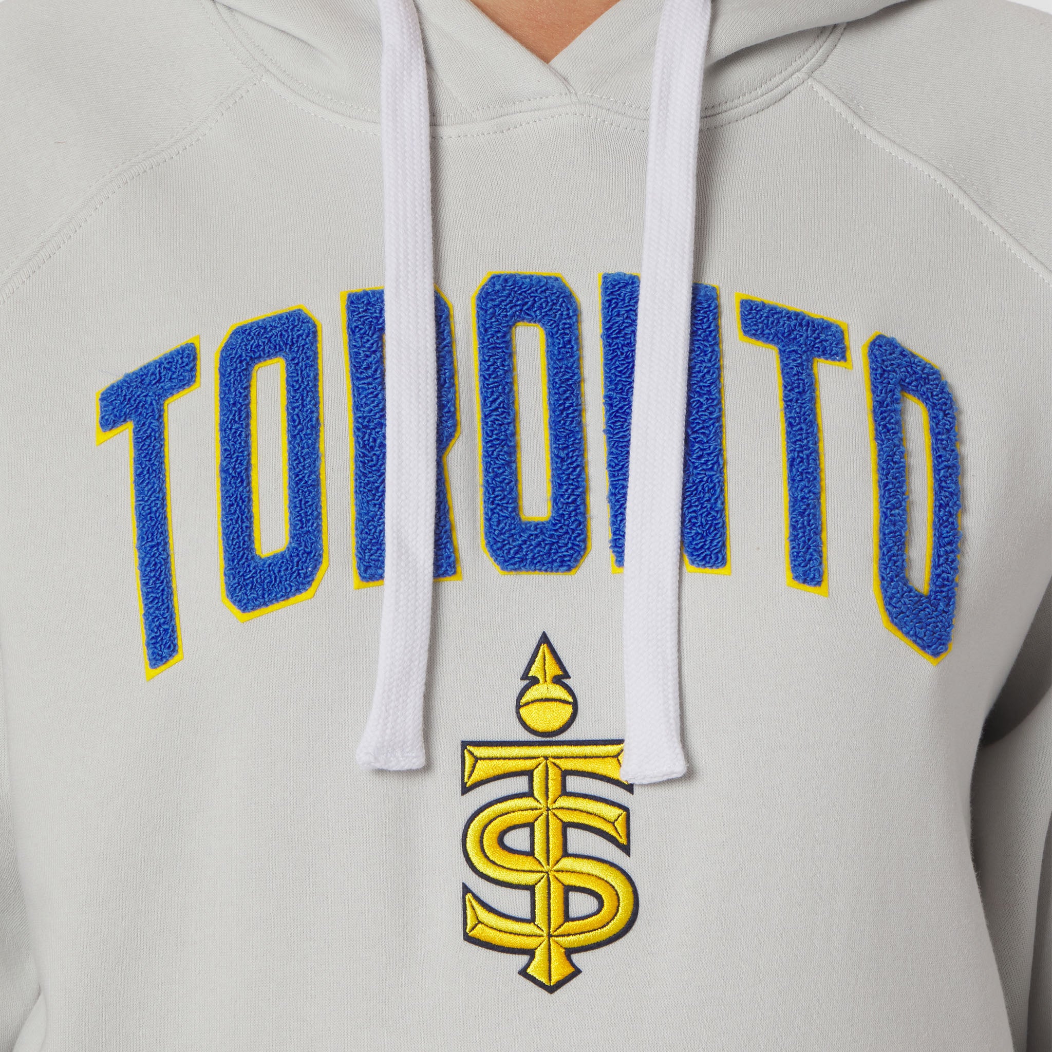 Gray hoodie with blue and yellow 'Toronto' text and logo on a plain background