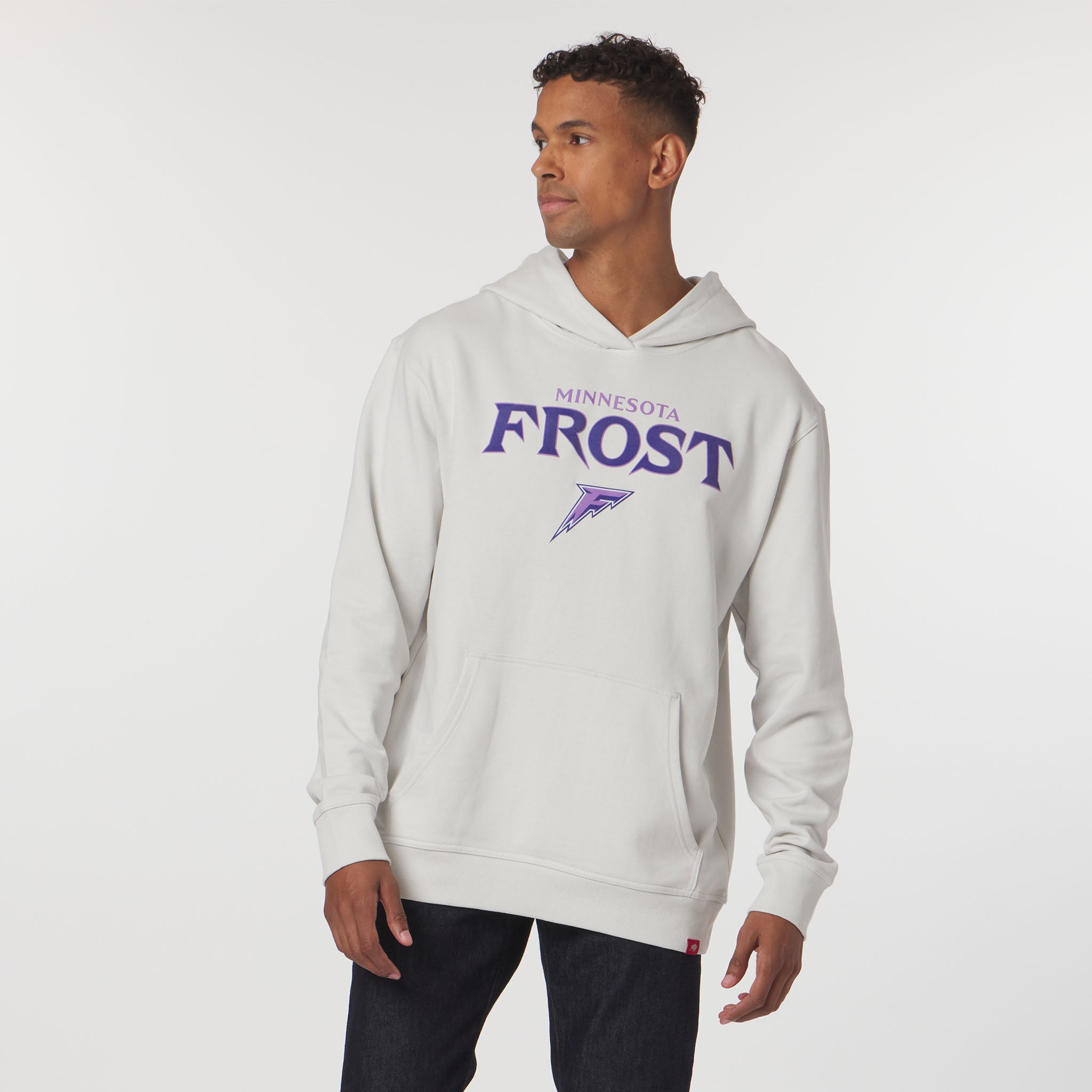 Man wearing a gray hoodie with 'Minnesota Frost' logo on a white background
