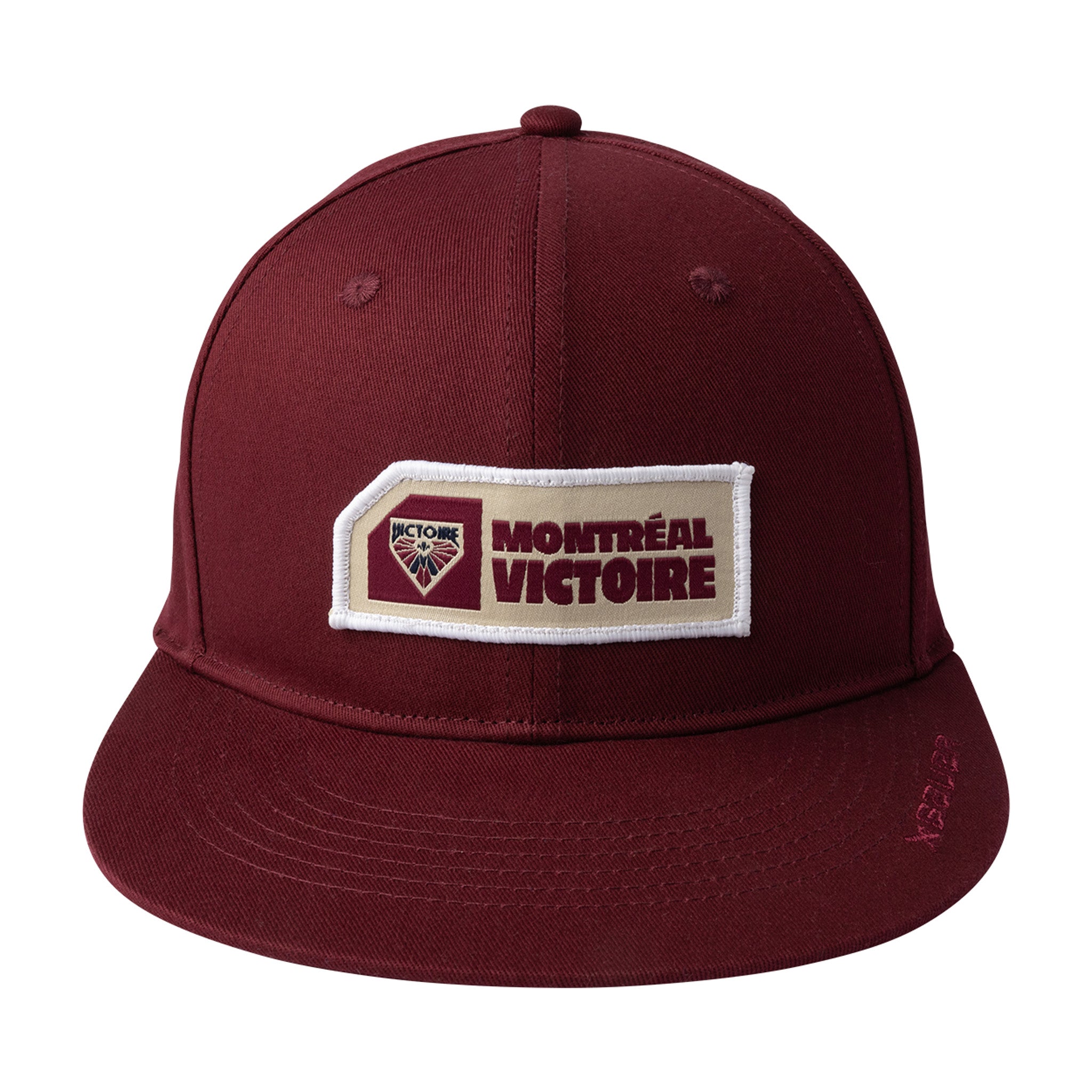 Maroon cap with 'Montreal Victoire' logo on a white background
