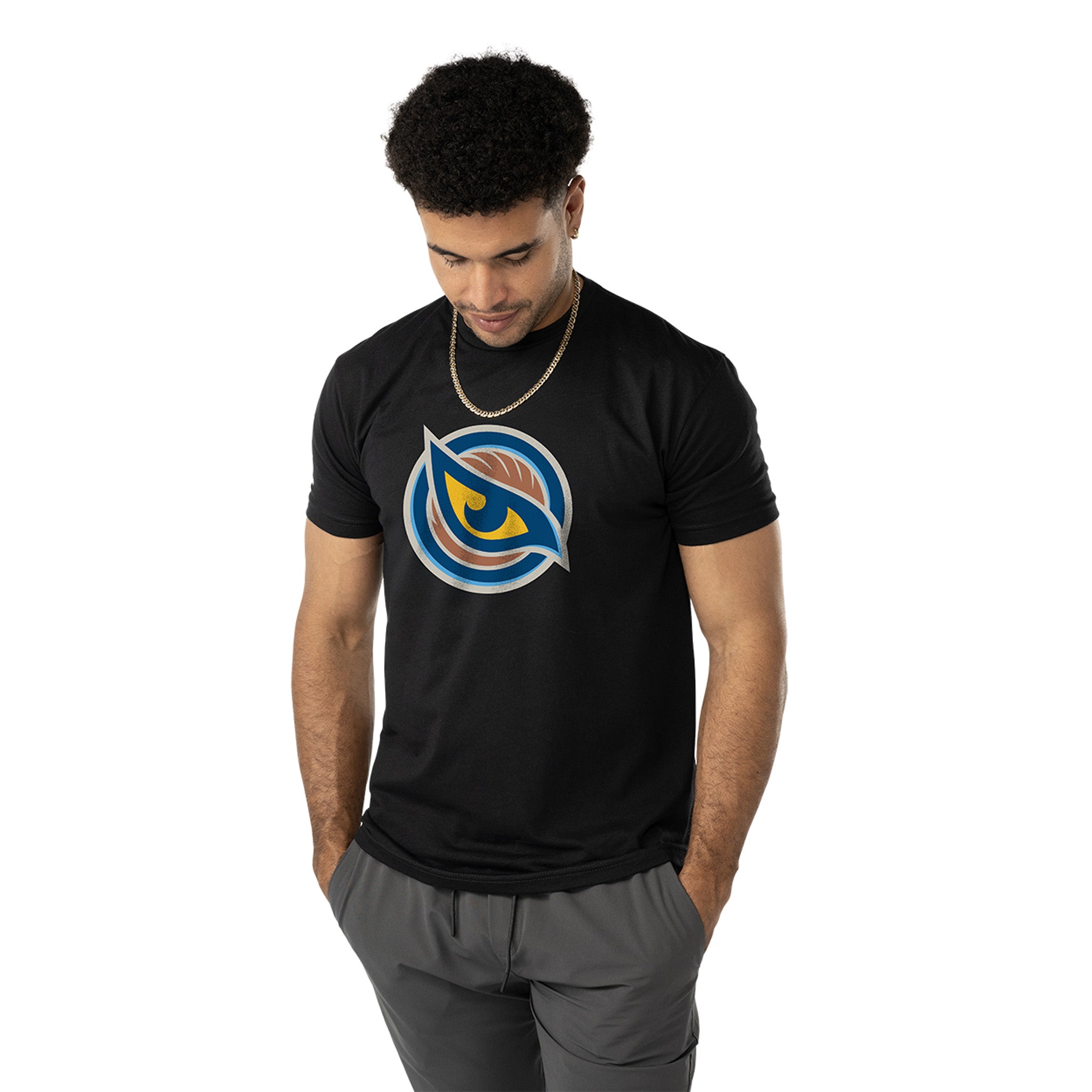 Man wearing a black t-shirt with a Vancouver Goldeneyes logo on a white background