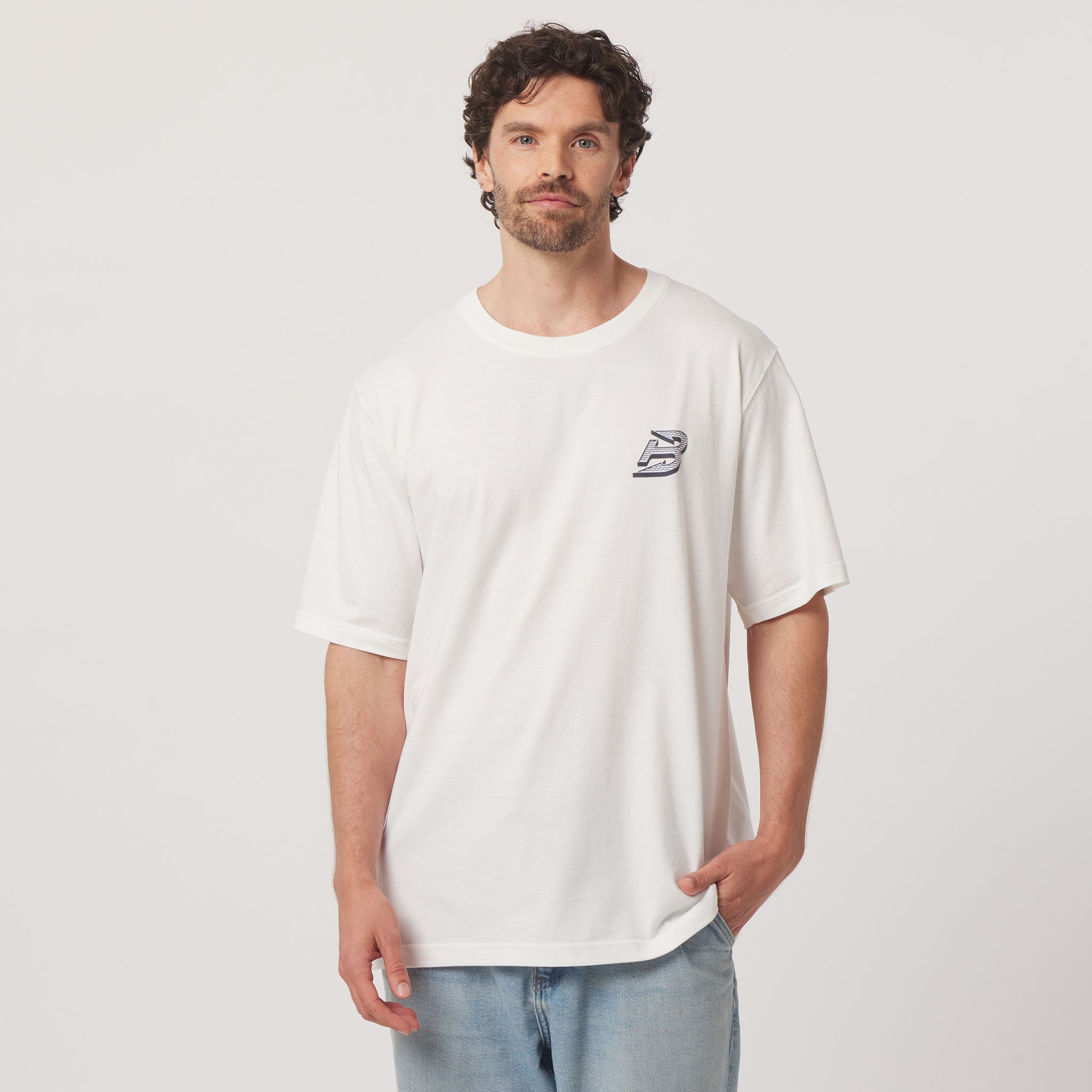 man wearing a white tshirt with a small boston fleet logo on the left chest. on a white background