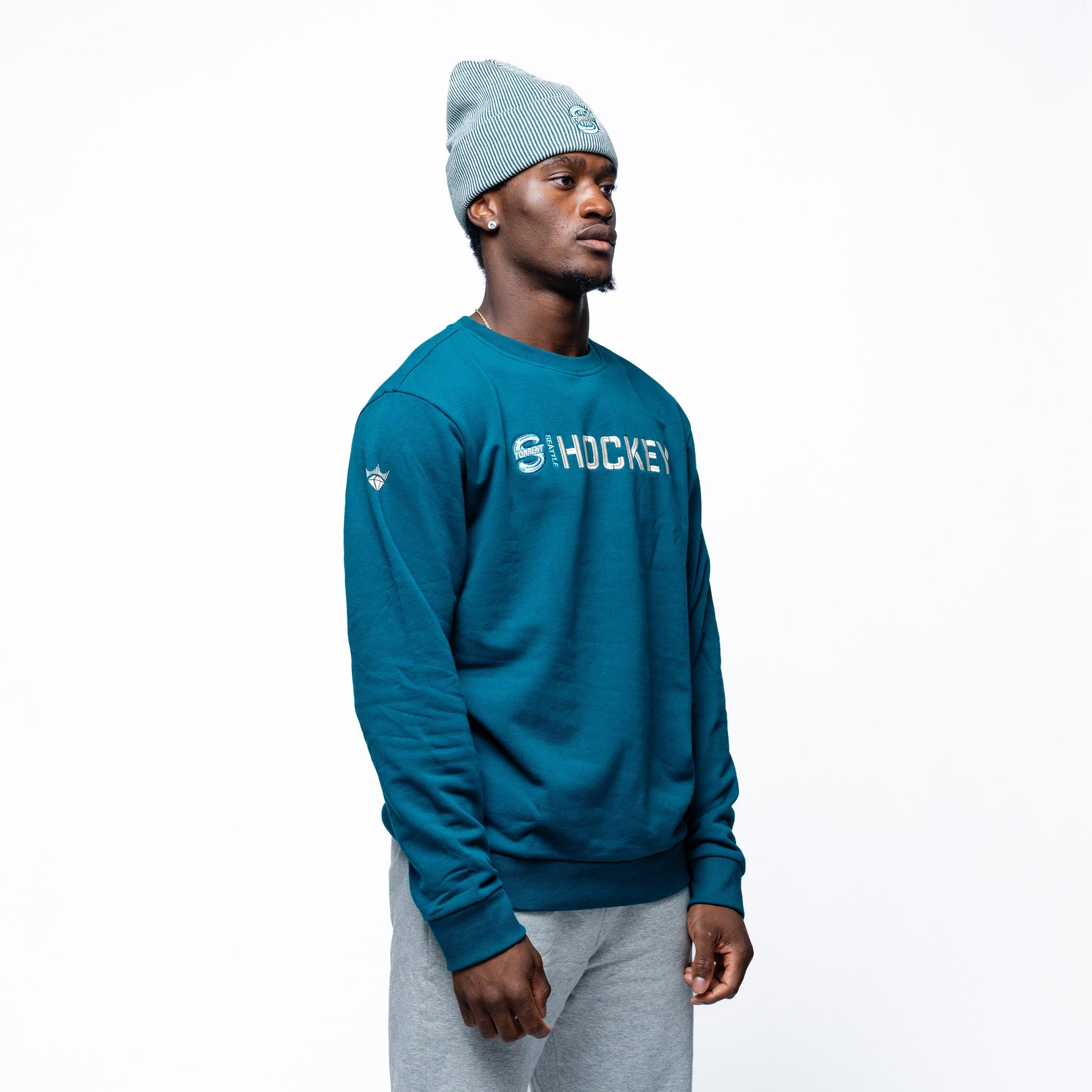 Man wearing green Adult Seattle Torrent Royalty Everyday Cloud Crew side angle