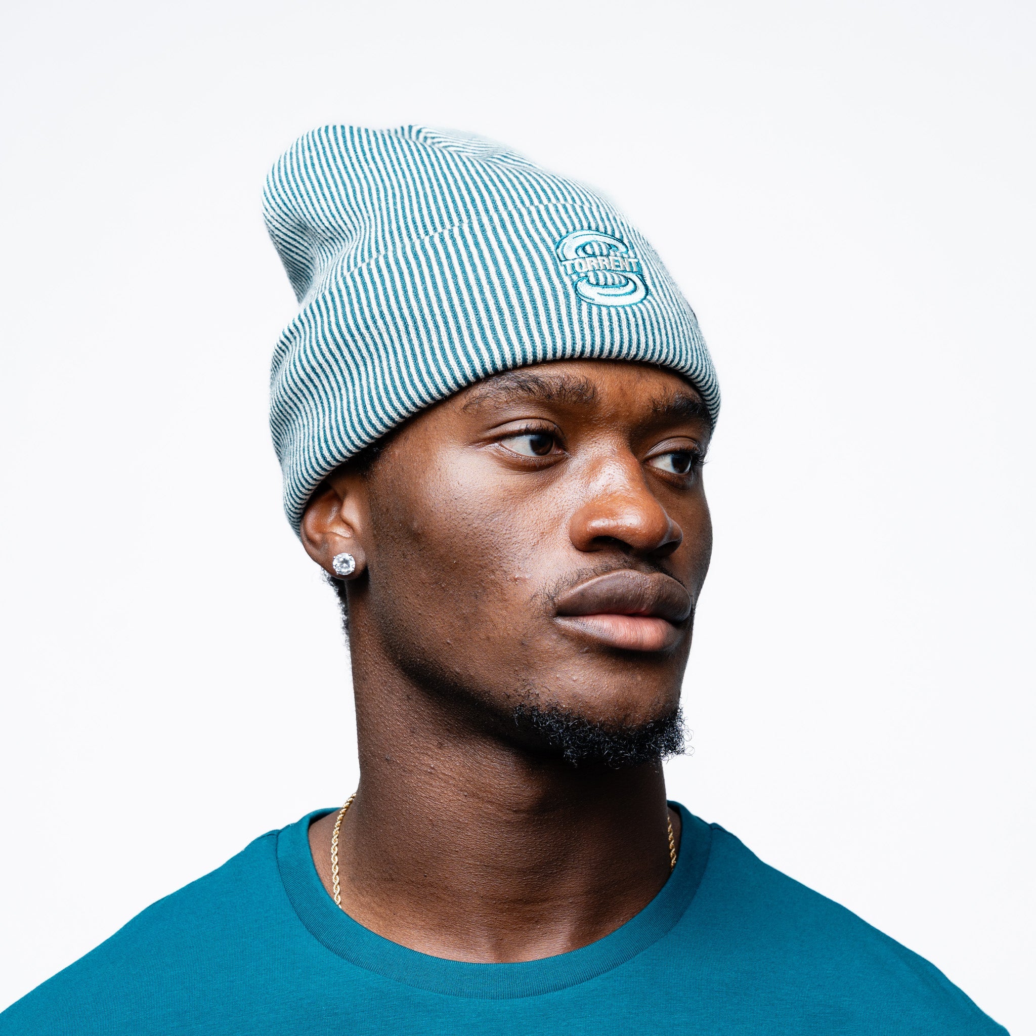 Man wearing the green Adult Seattle Torrent Royalty Double Knit Beanie on a slight angle