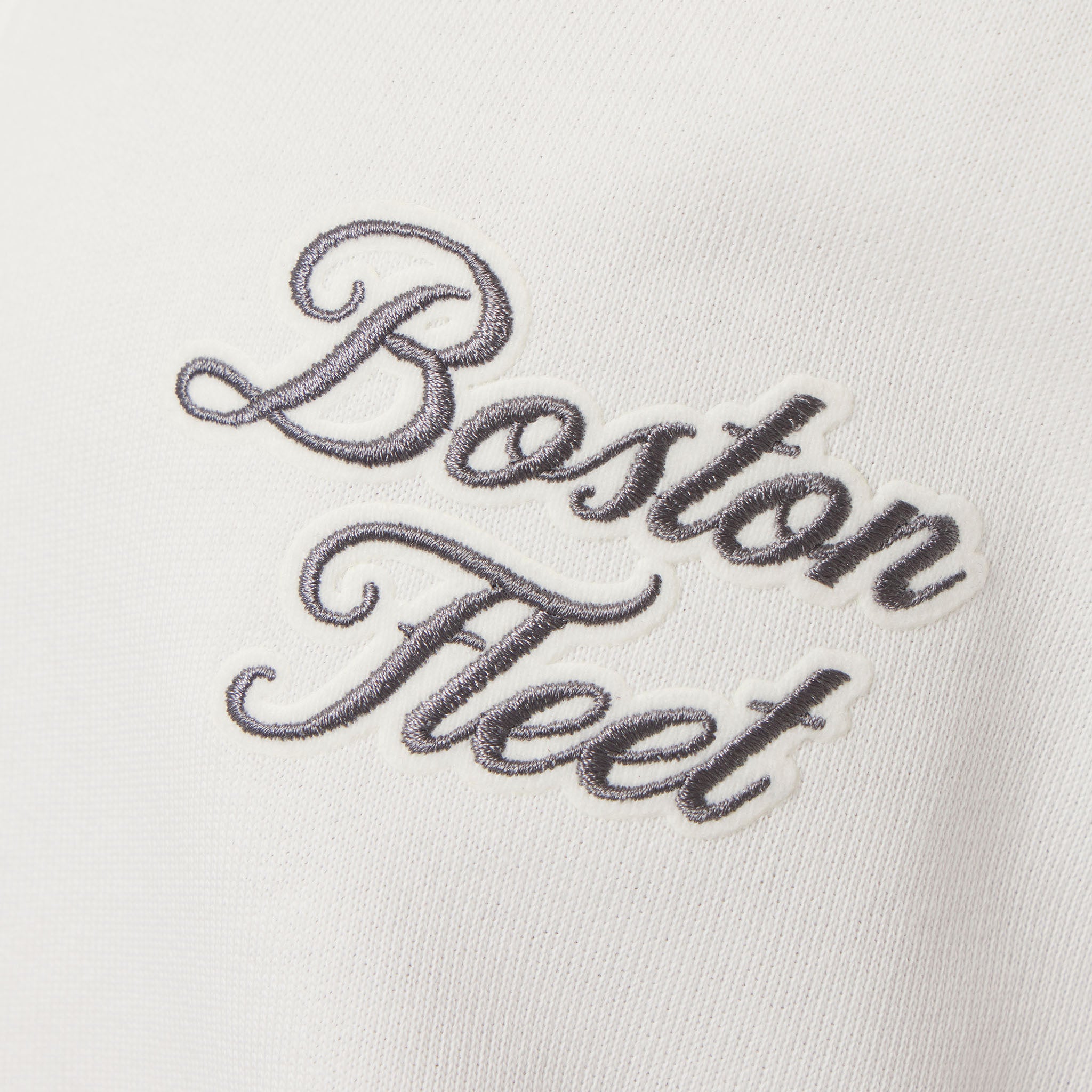 Embroidered text 'Boston Fleet' on a white background