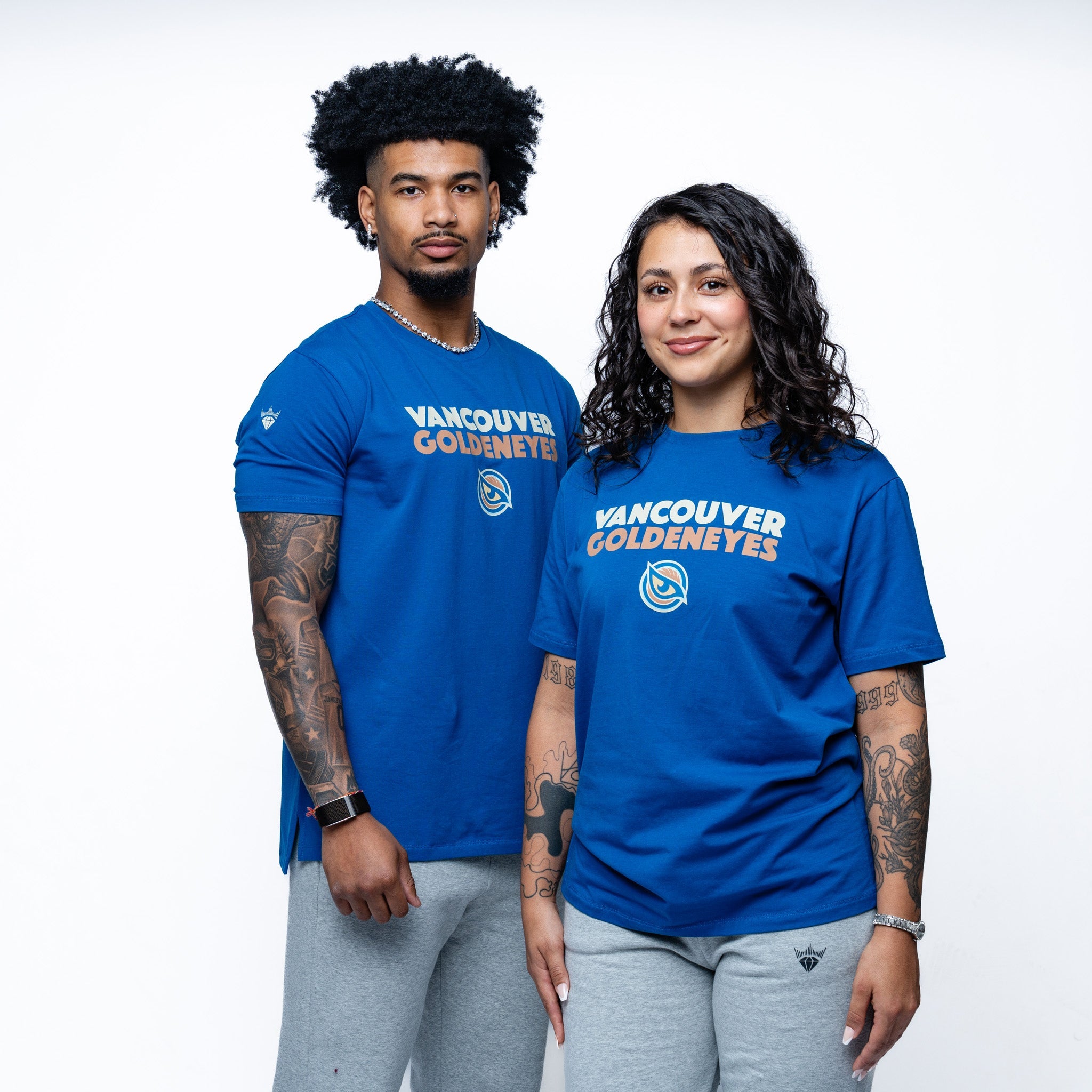Man and woman wearing blue Person wearing Blue Adult Vancouver Goldeneyes Royalty Local Sideline T-Shirt