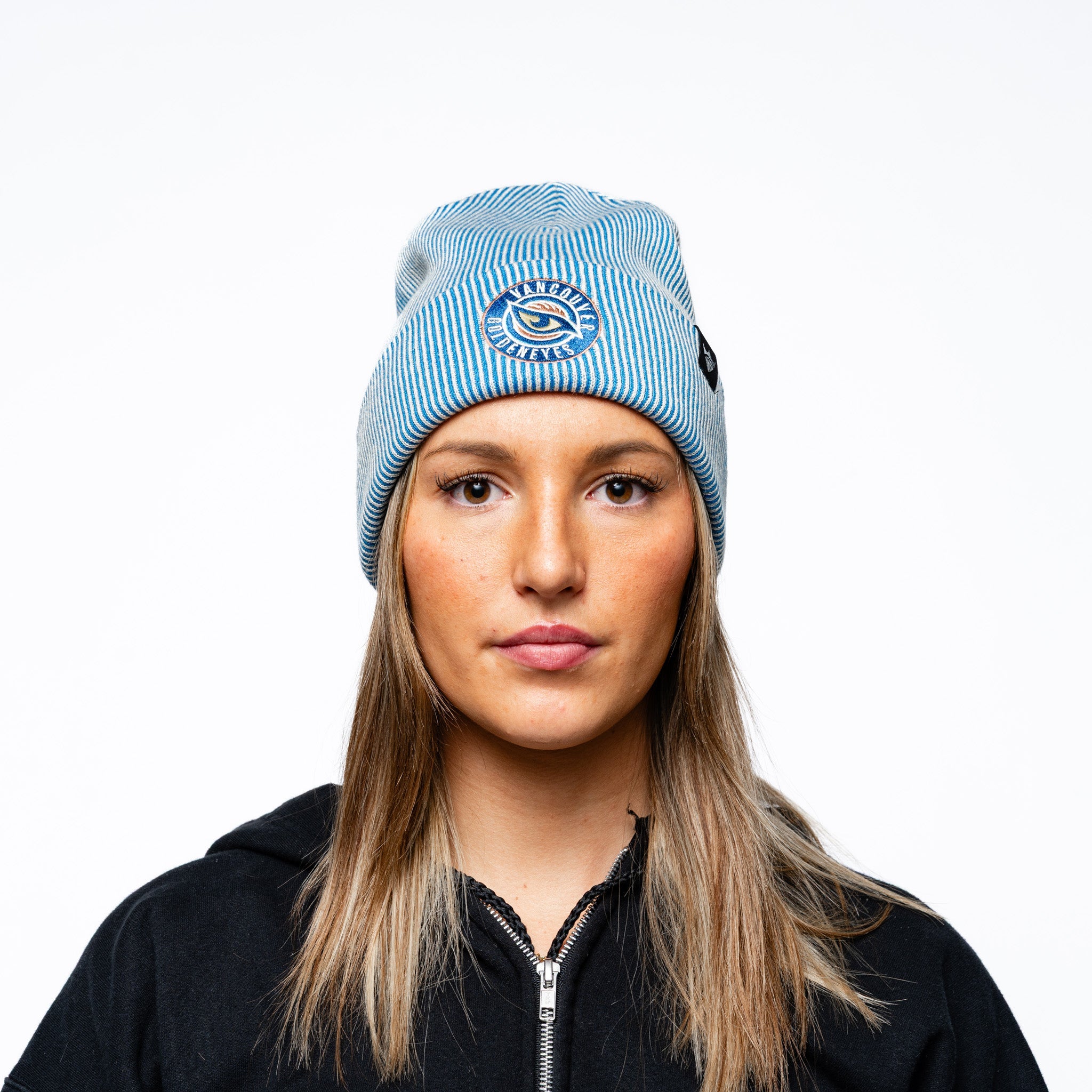 Woman wearing blue Adult Vancouver Goldeneyes Royalty Double Knit Beanie front angle