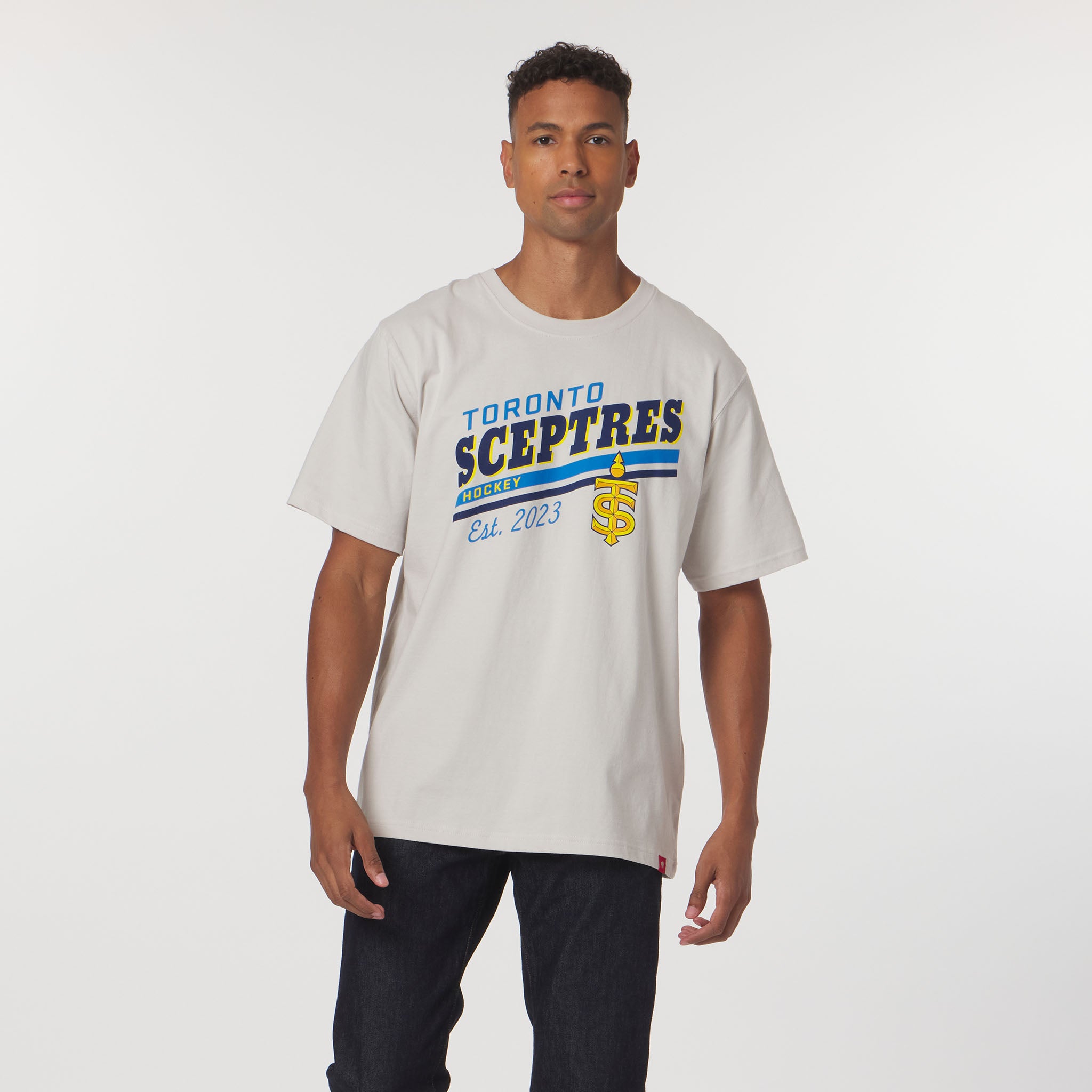 Man wearing a white t-shirt with 'Toronto Sceptres' text on a white background