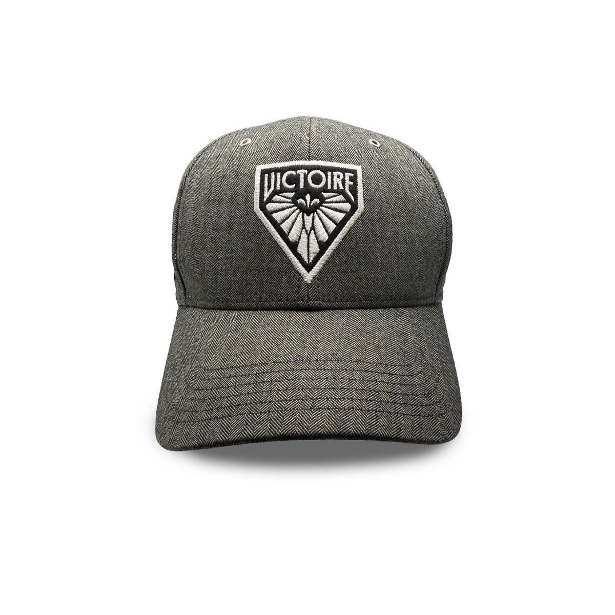 Front of a gray herringbone hat with a black and white Montreal Victoire logo embroidered. 
