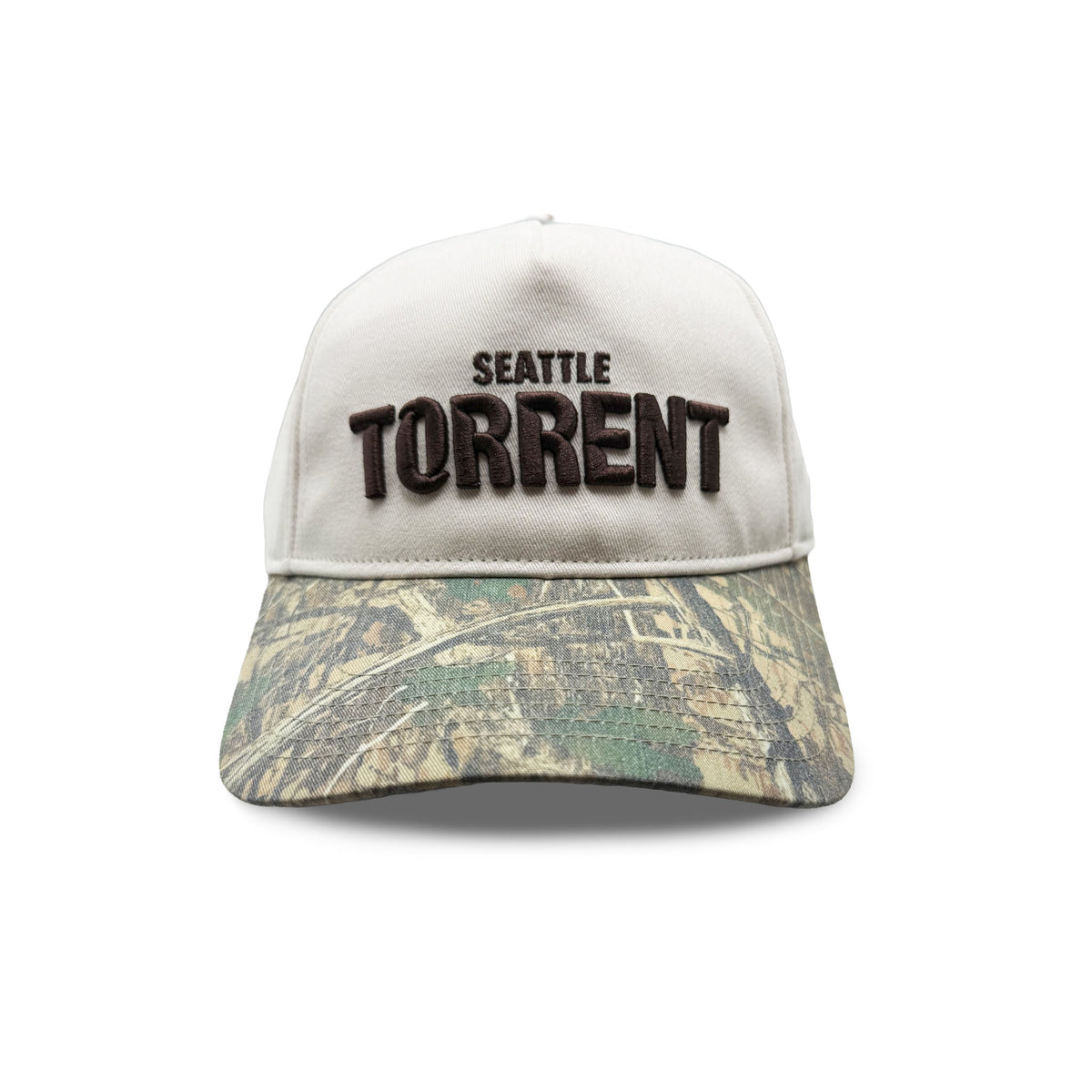 Front of cream hat with camouflage brim. 'SEATTLE TORRENT' embroidered in brown. 