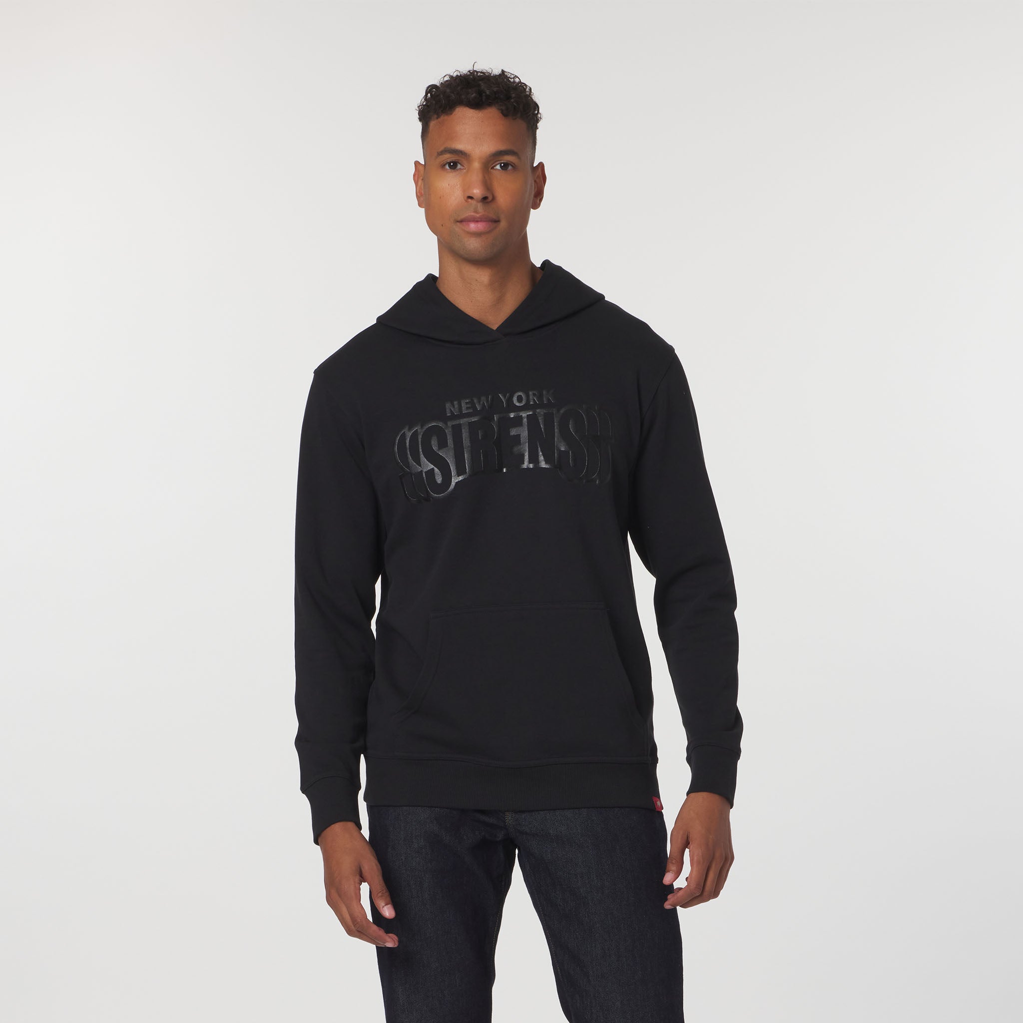 Man wearing a black hoodie with text on a white background