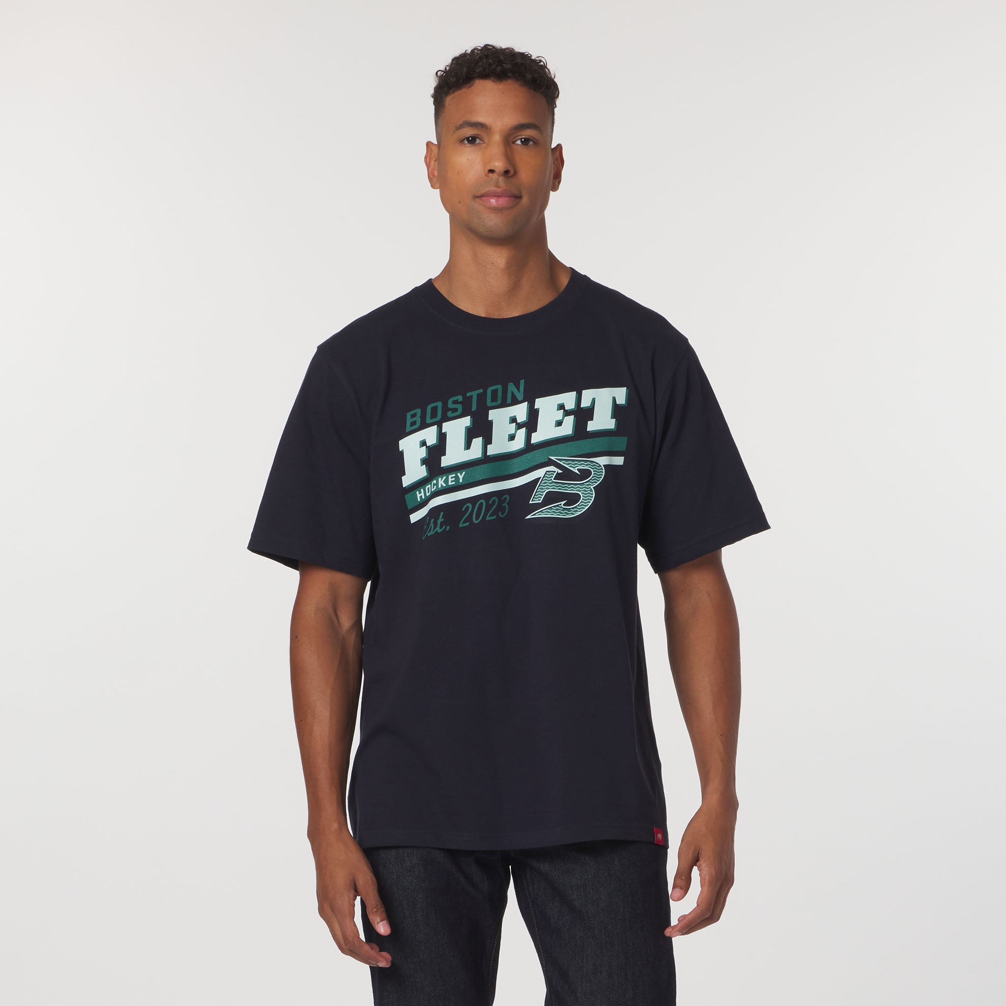 Man wearing a black t-shirt with 'Boston Fleet' text on a white background