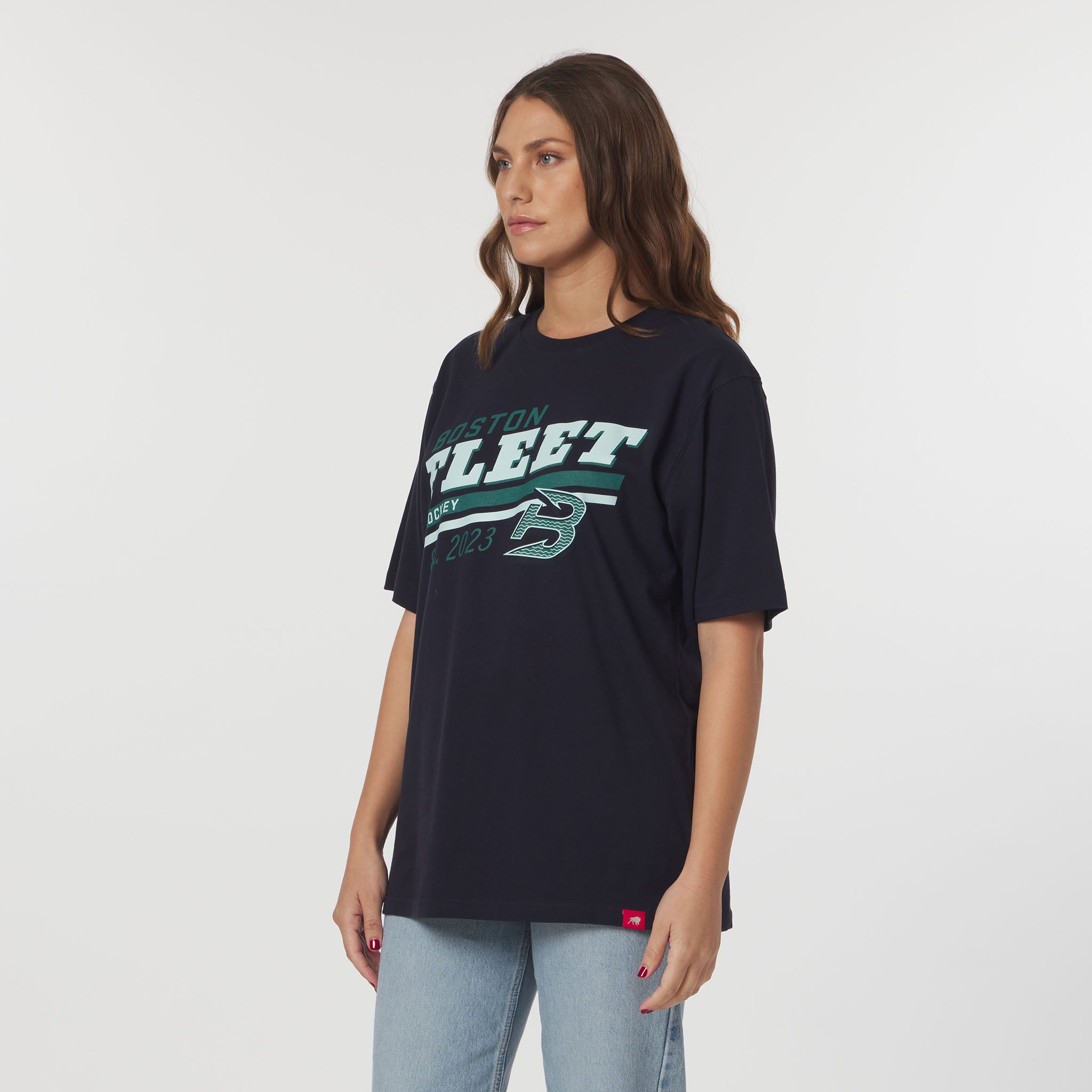 Woman wearing a black t-shirt with 'Boston Fleet' text on a white background