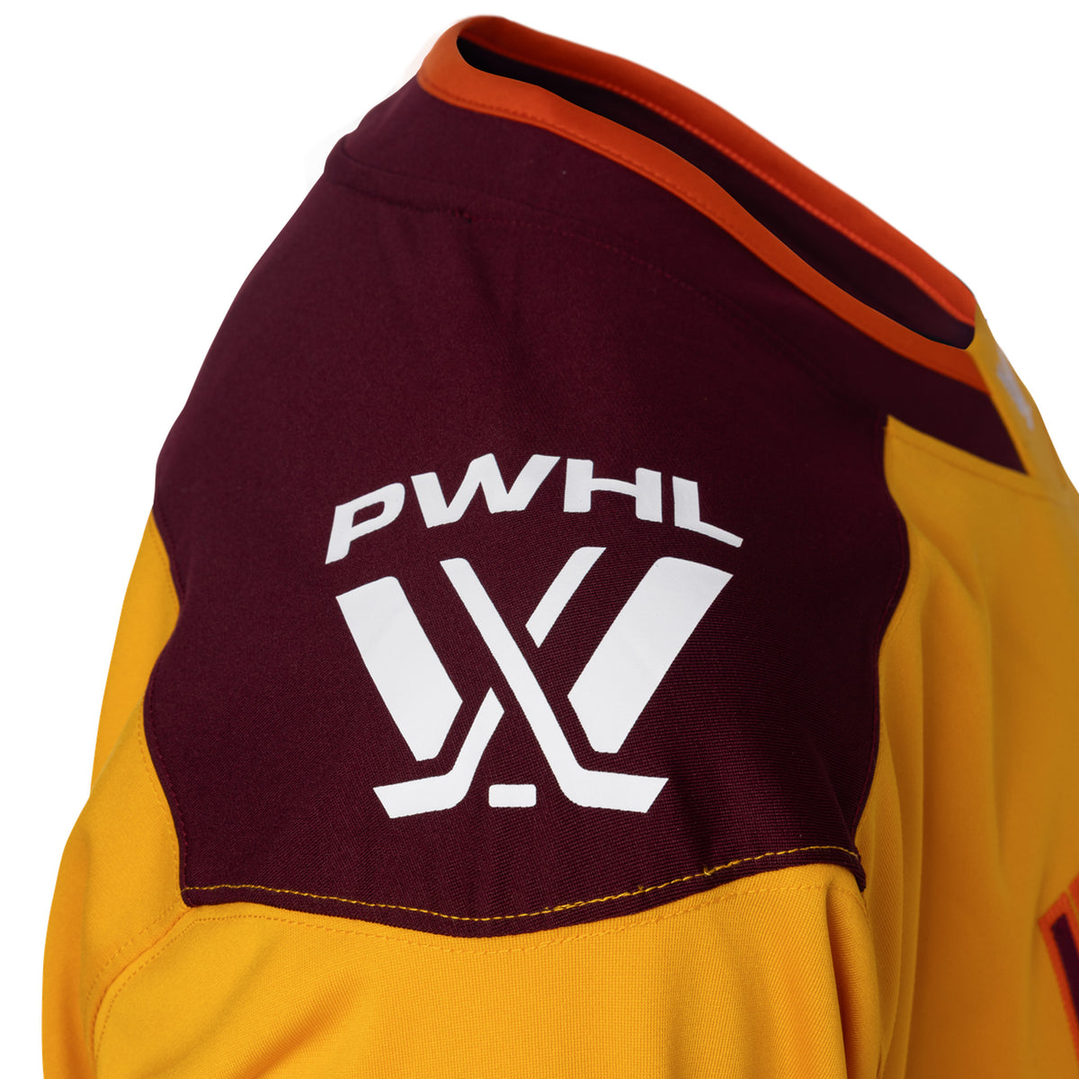 The maroon right shoulder of a gold jersey with orange trim on the collar. A white PWHL logo is on the right shoulder.