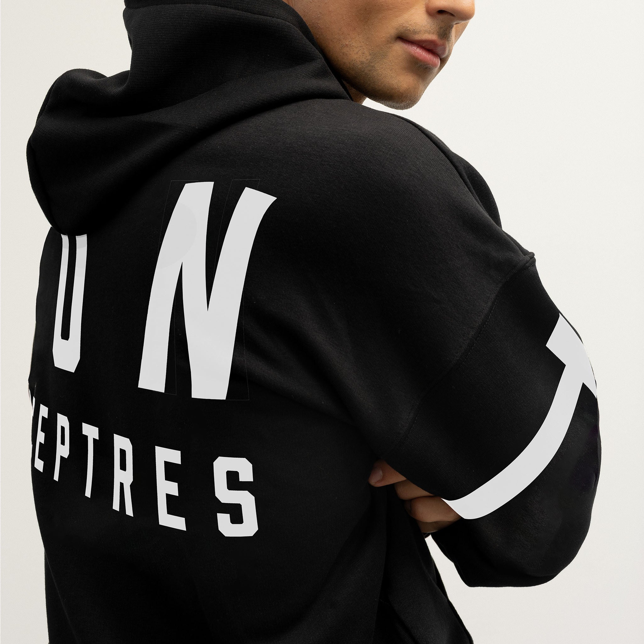 Black hoodie with white Toronto Sceptres text and stripes on a plain background