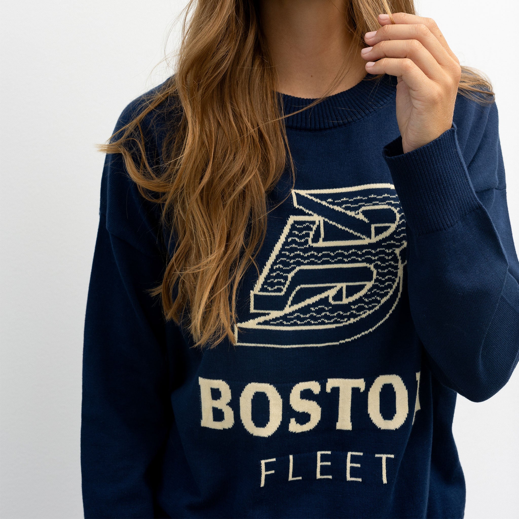 Navy blue sweatshirt with 'Boston Fleet' text and logo on a plain background