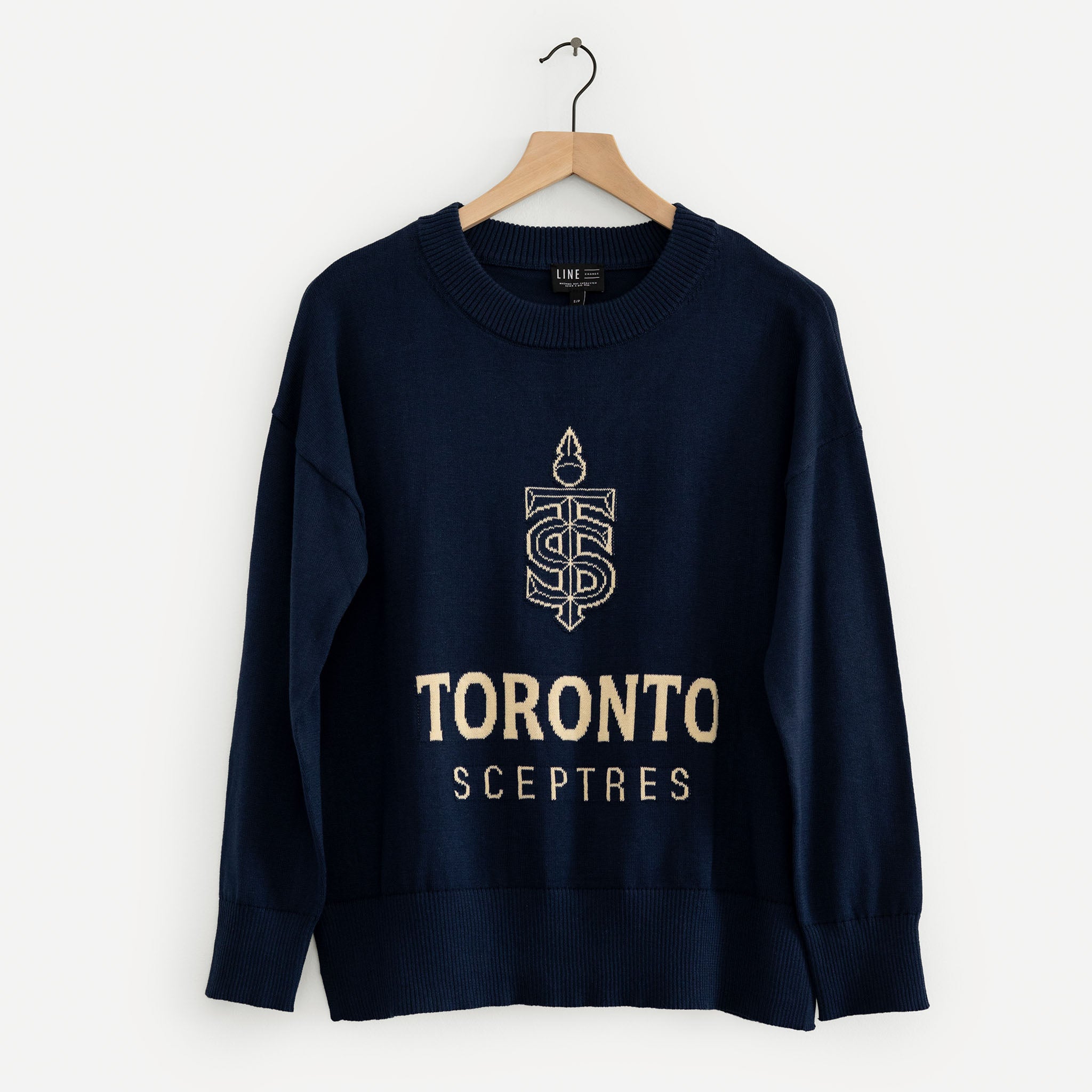 Navy blue sweatshirt with 'Toronto Sceptres' text and logo on a hanger against a white background