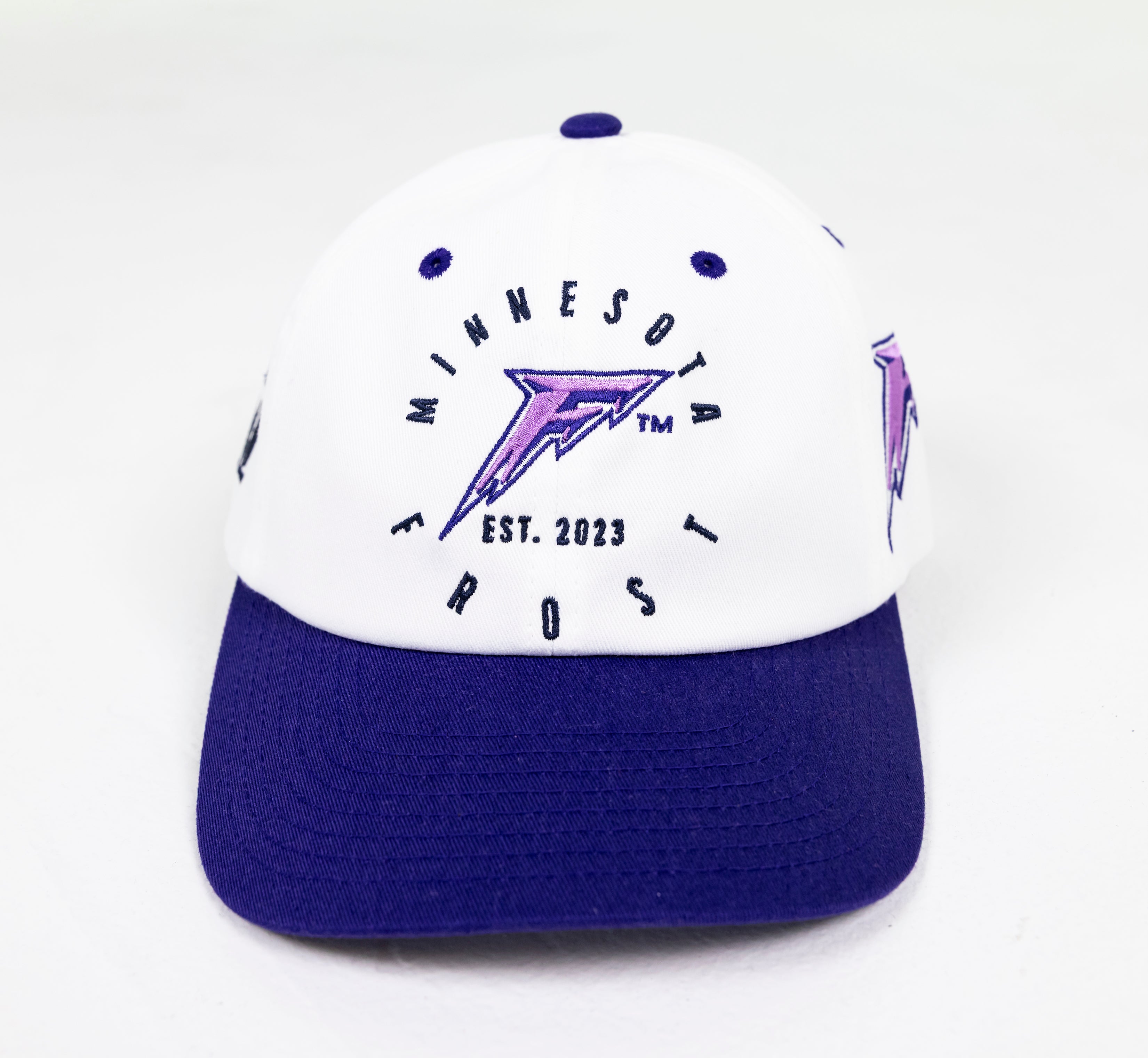 White and blue cap with purple logo and text on a white background