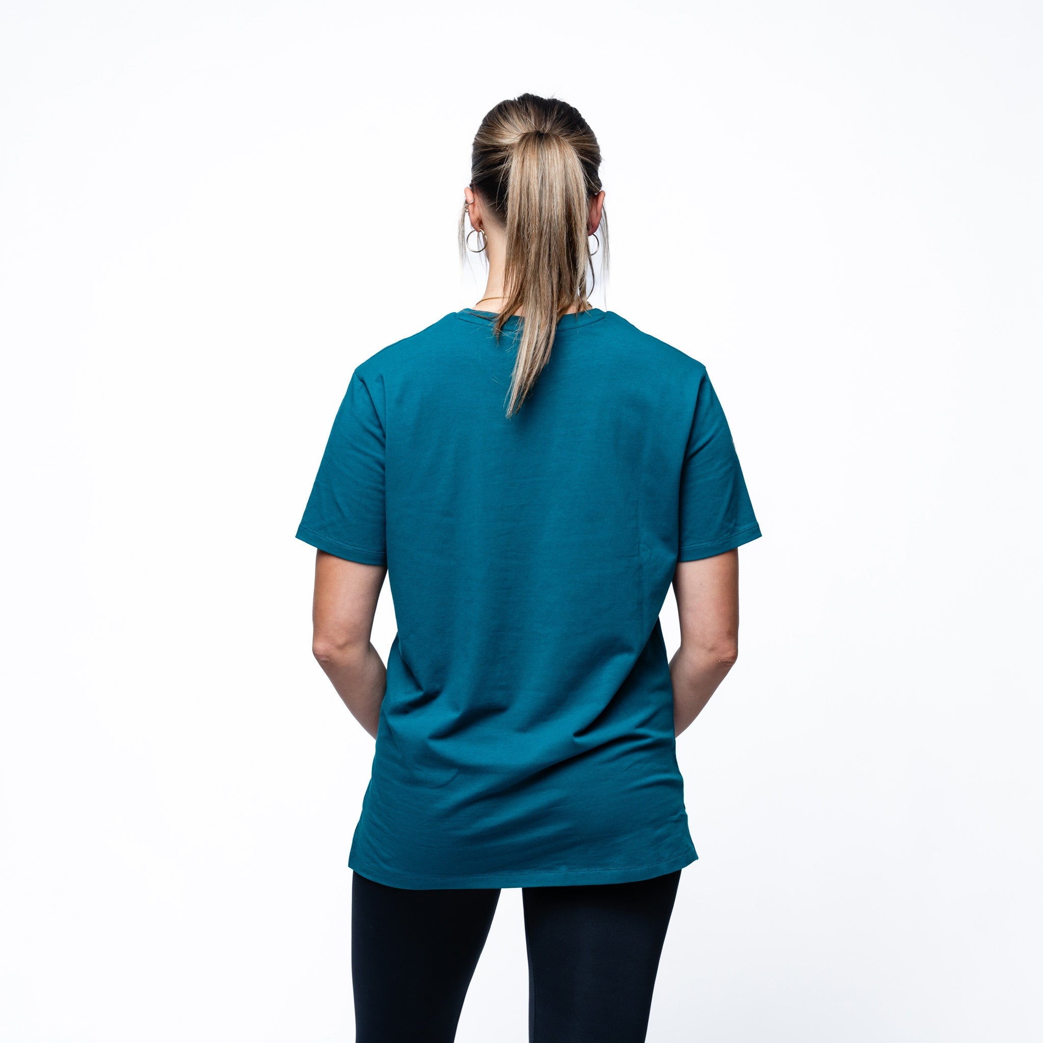 Person wearing green Adult Seattle Torrent Royalty Local Sideline T-Shirt back angle