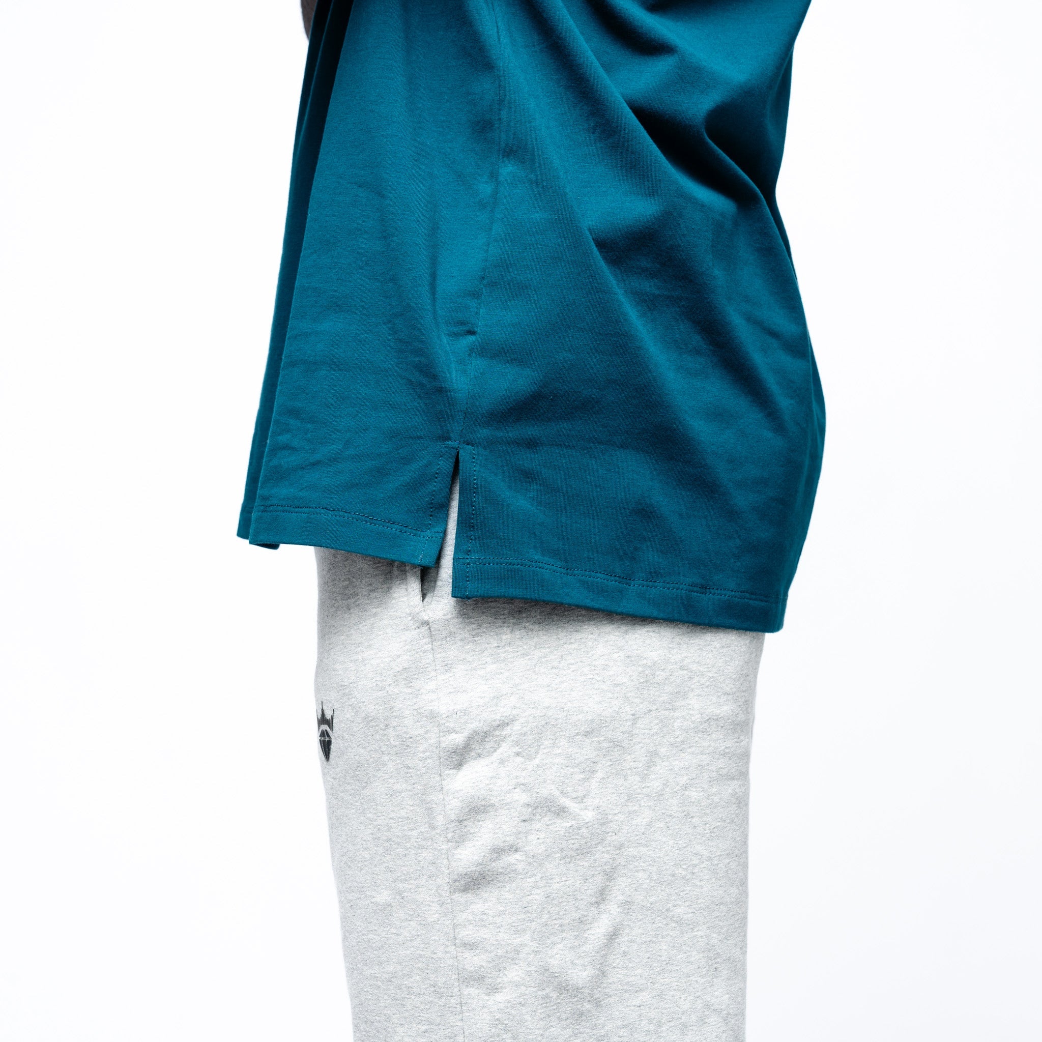 Close up of side of green Adult Seattle Torrent Royalty Essential Sideline T-Shirt side angle