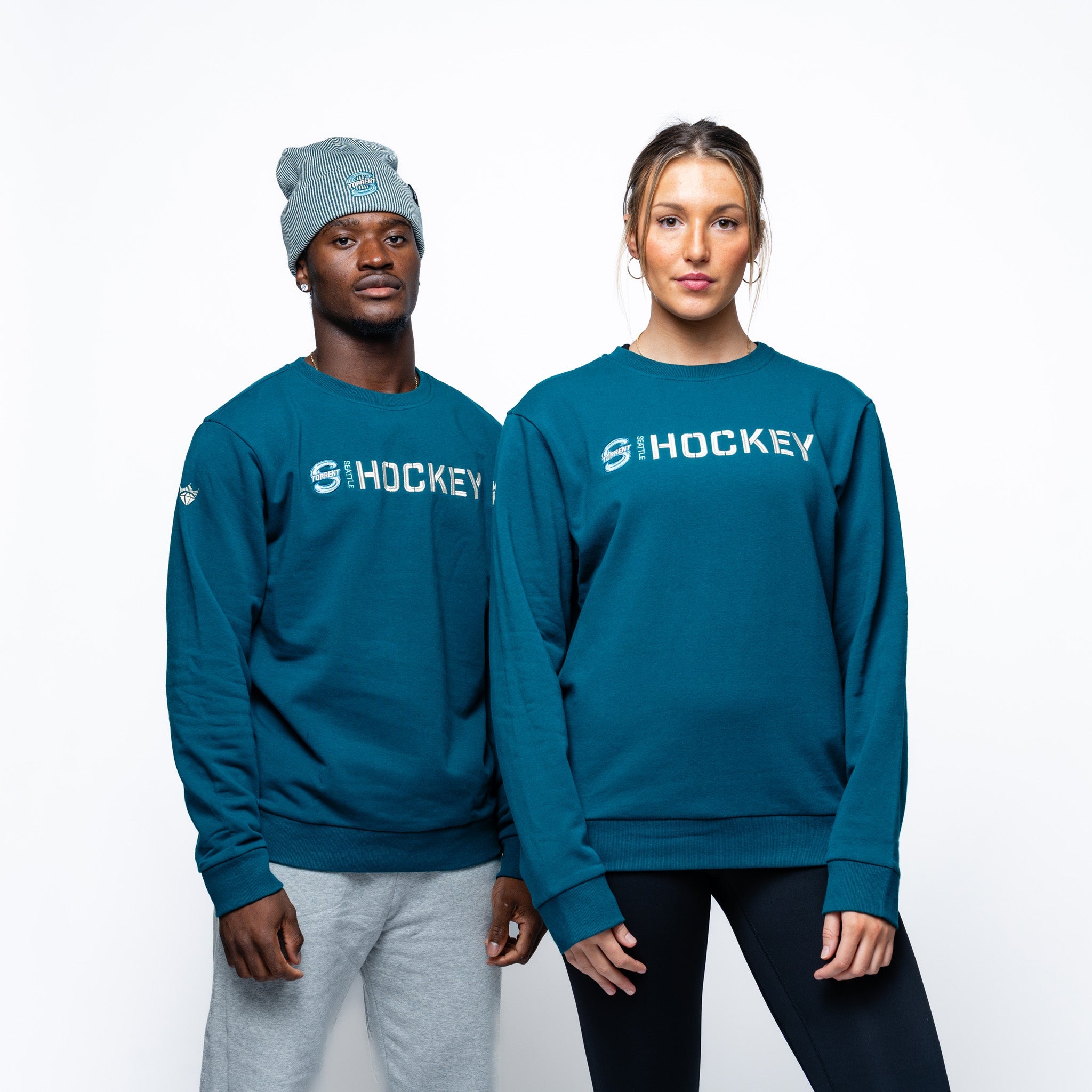 Mand and woman wearing the green Adult Seattle Torrent Royalty Everyday Cloud Crew