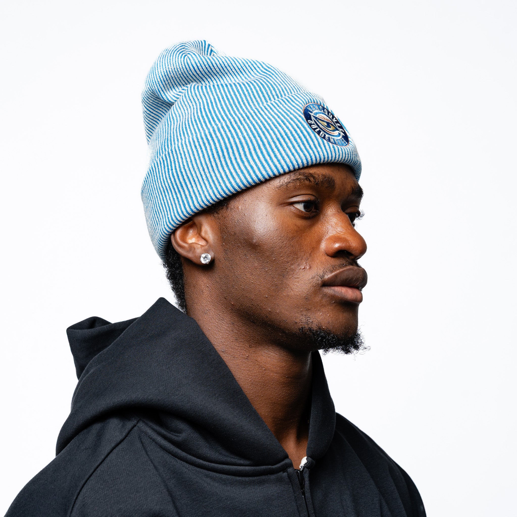 Man wearing blue Adult Vancouver Goldeneyes Royalty Double Knit Beanie side angle