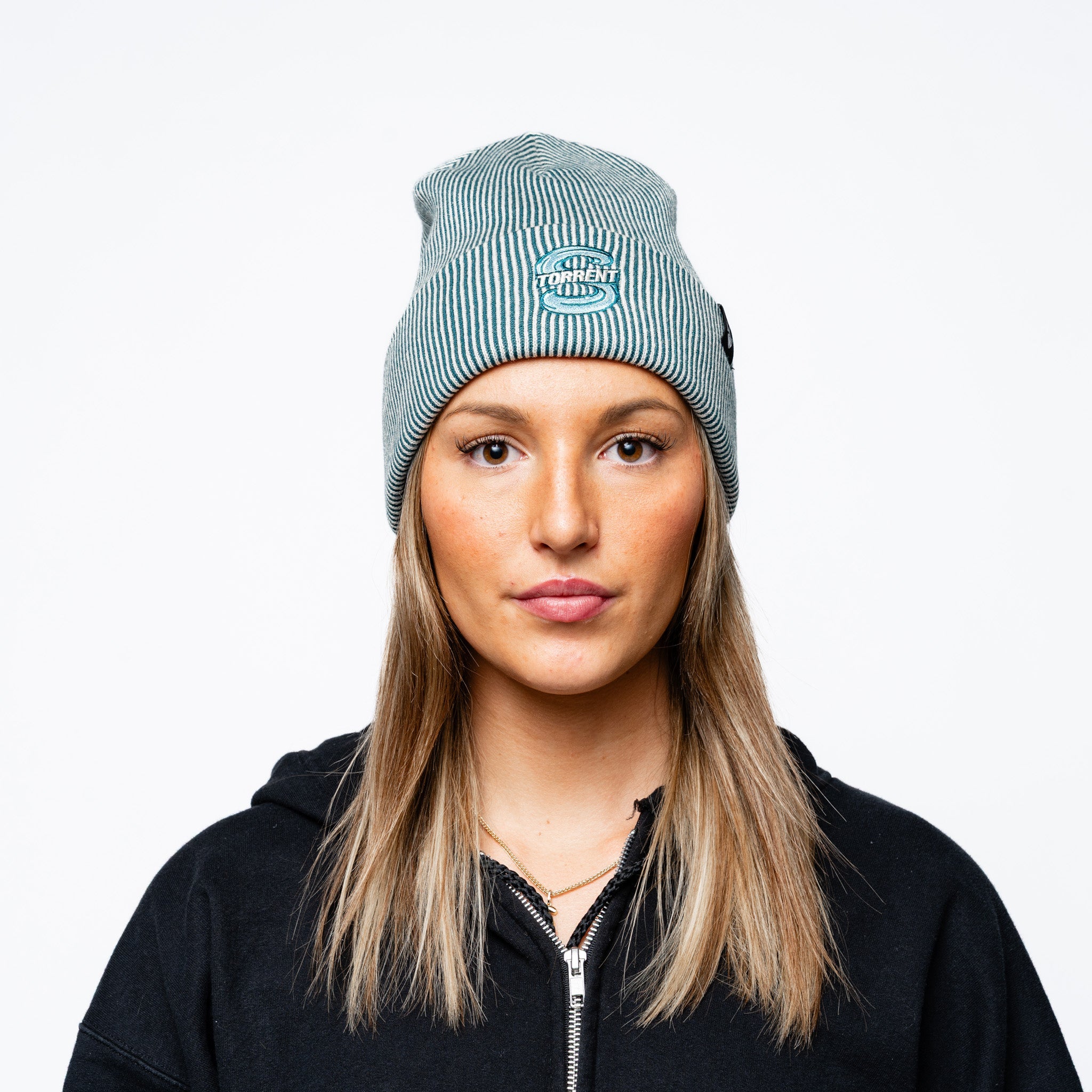 Woman wearing the green Adult Seattle Torrent Royalty Double Knit Beanie