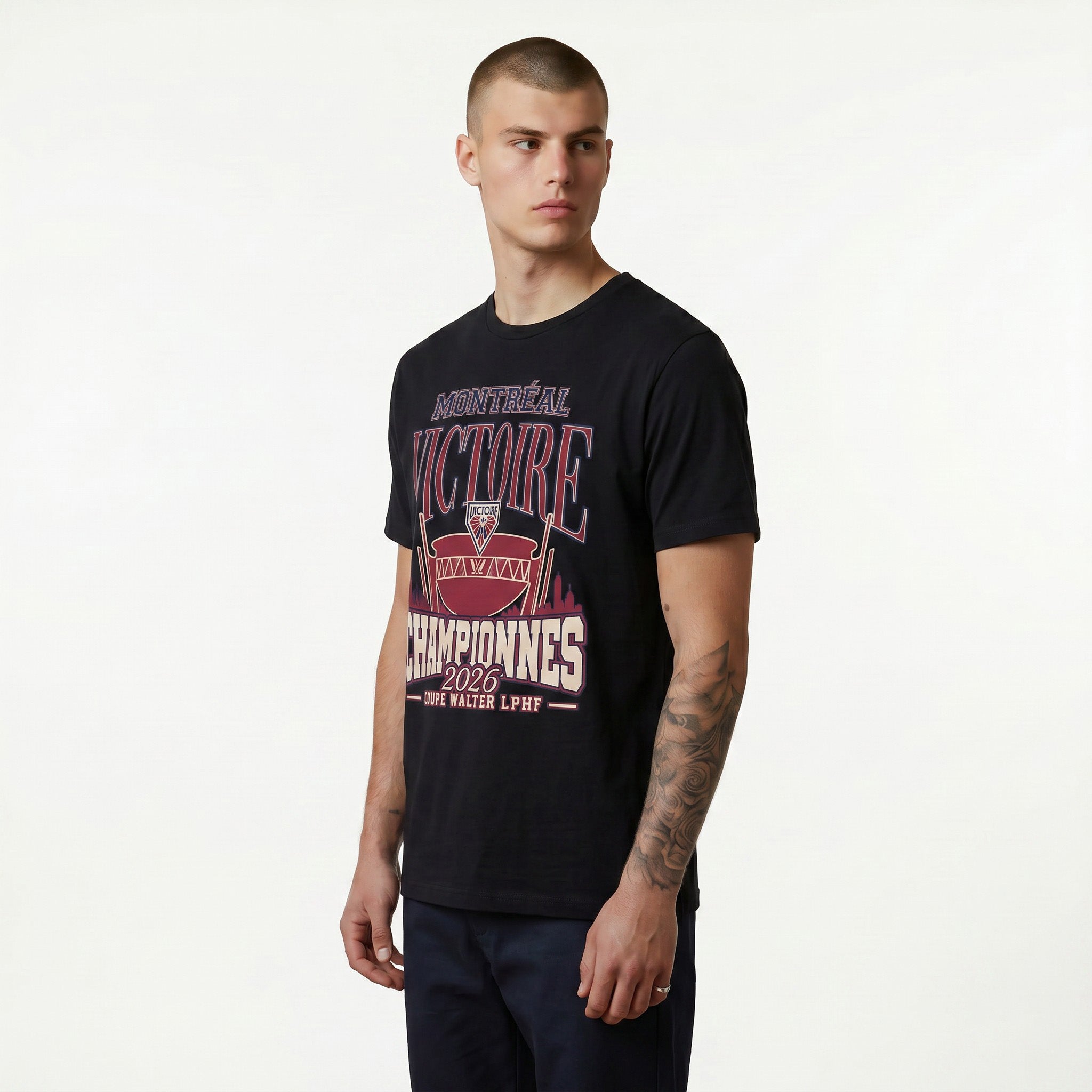 Man wearing a black t-shirt with text and graphics on a white background