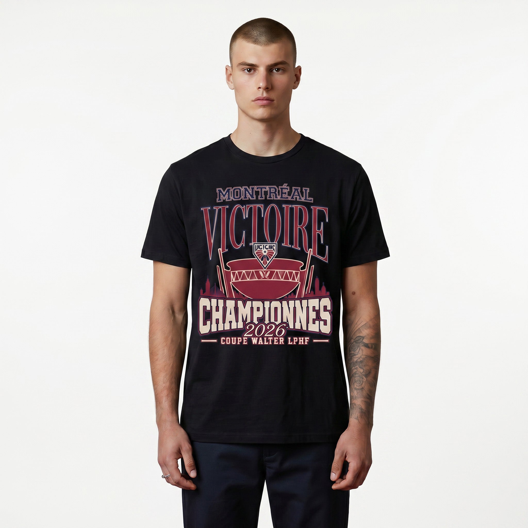 Man wearing a black t-shirt with 'Montreal Victoire Championnes 2026' text and logo on a white background