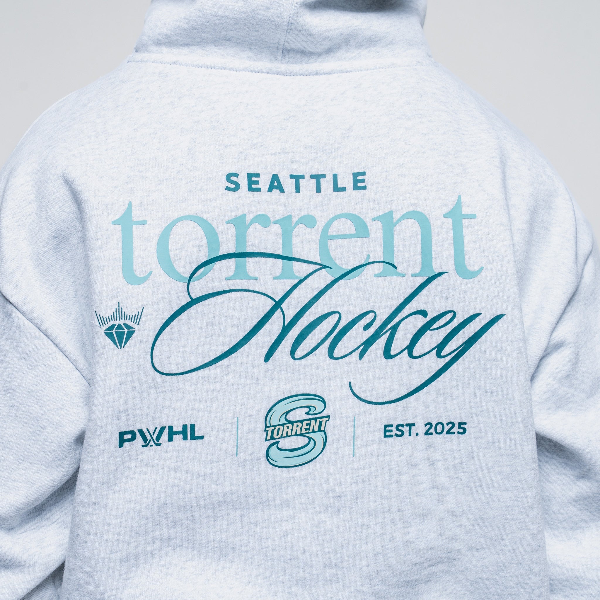 Light gray hoodie with 'Seattle torrent Hockey' text and logos on a plain background
