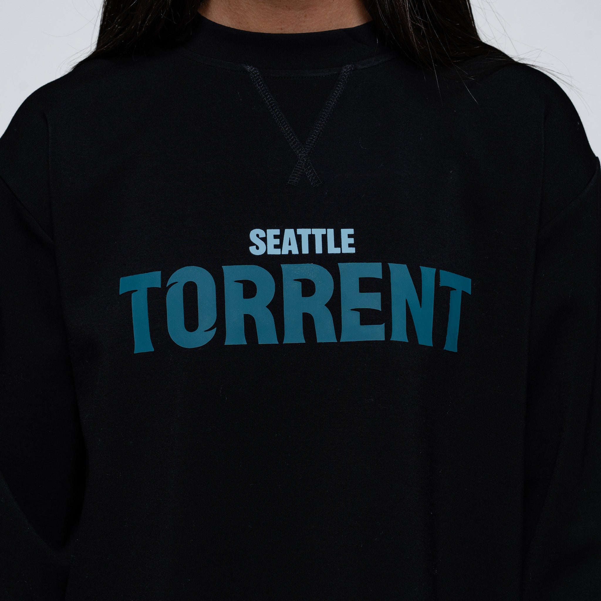 Black hoodie with 'Seattle Torrent' text on a plain background