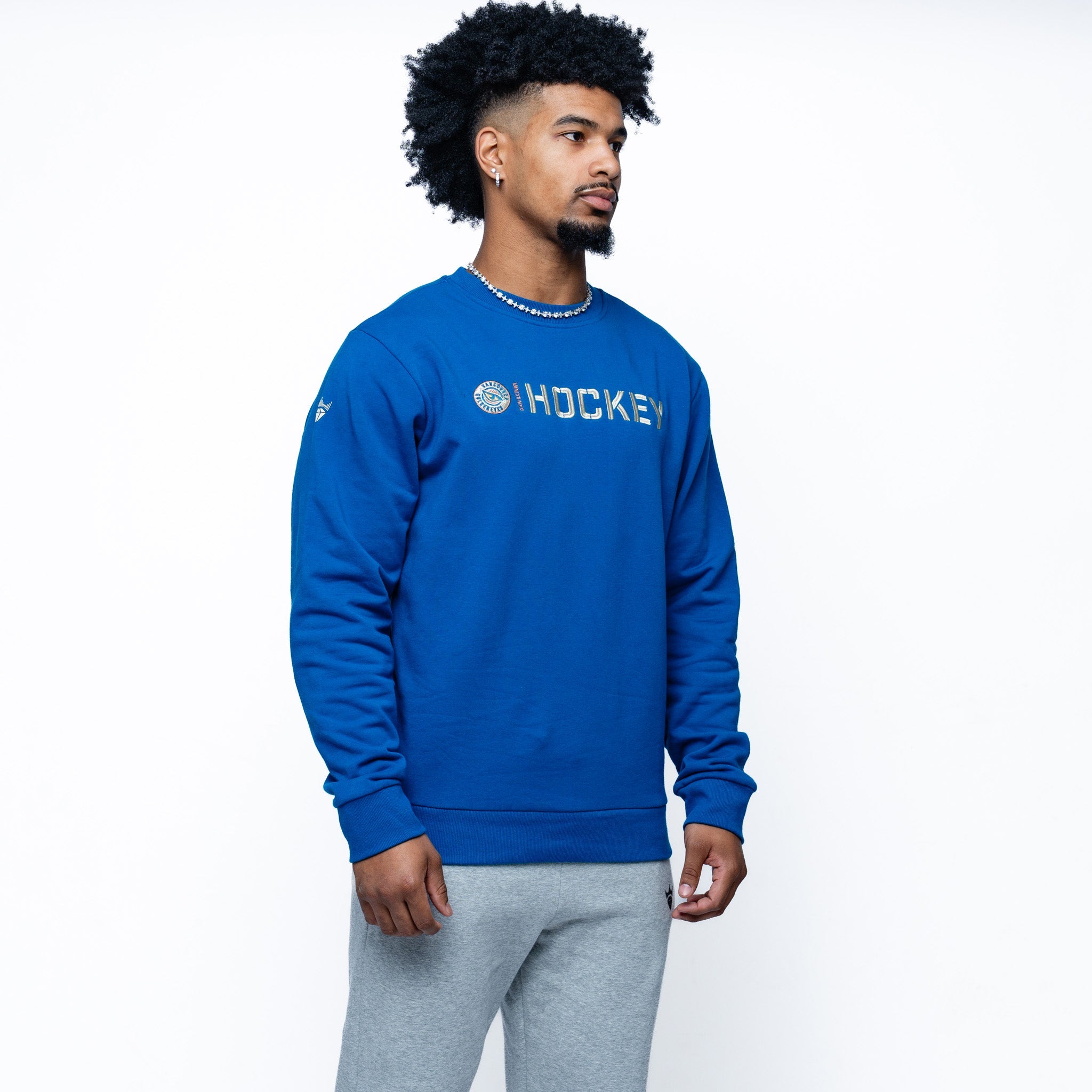 Man wearing blue Adult Vancouver Goldeneyes Royalty Everyday Cloud Crew side angle