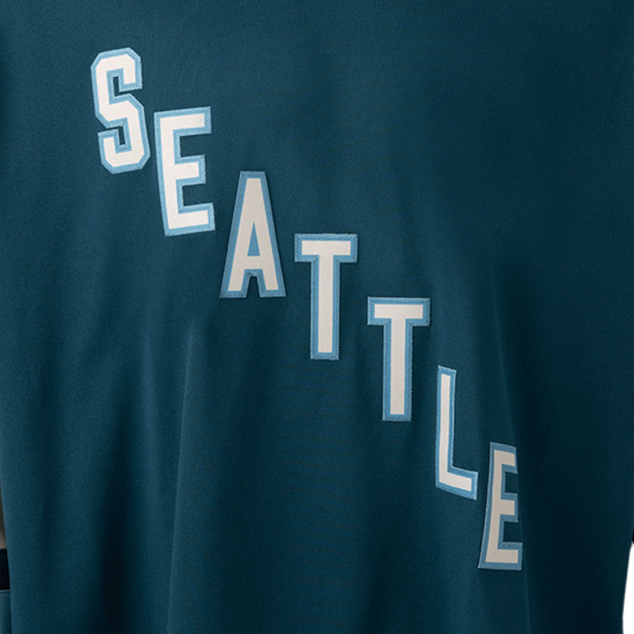Navy blue shirt with 'SEATTLE' printed in white letters